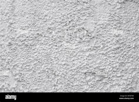 Gray stucco on wall of house. Construction industry Stock Photo - Alamy