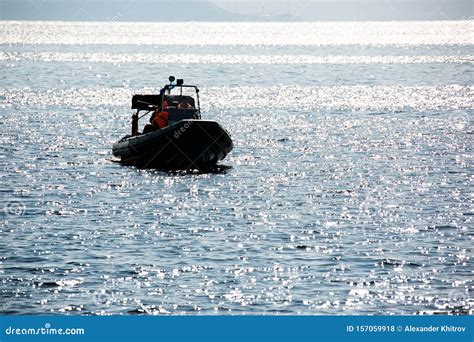 Rescue Marine Vessel during a Rescue Operation at Sea. a Motor Boat ...