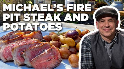 Michael Symon's Fire Pit Steak and Potatoes | Symon Dinner's Cooking Out | Food Network - YouTube