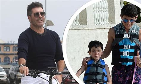 Simon Cowell was outside with son Eric, six, and stepson Adam, 14, when he fell off electric ...