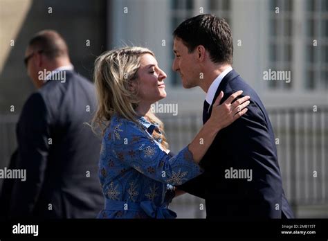 Canada's Foreign Minister Melanie Joly, left, greets Canadian Prime Minister Justin Trudeau ahed ...