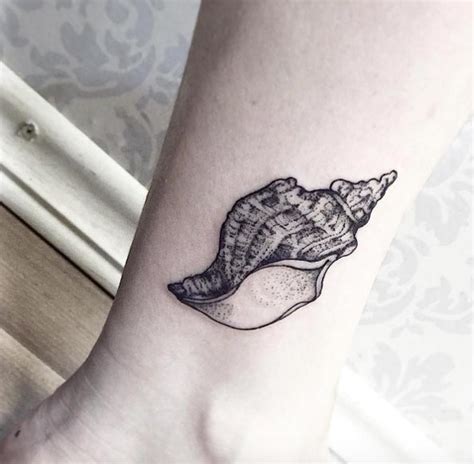 45 Beautiful Seashell Tattoos You'll Love - TattooBlend