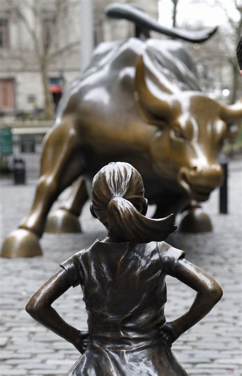 'Fearless Girl' statue stares down Wall Street's iconic bull - CityNews ...