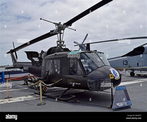 UH-1 Huey Gunship on flight deck of the USS Midway aircraft carrier ...