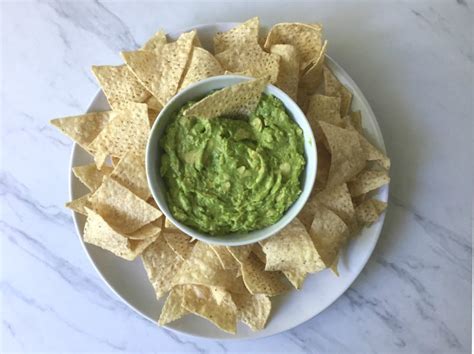 Guacamole with Tortilla Chips and Carrots | The Scramble