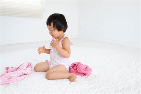 Child Changing Clothes Stock Photo - Download Image Now - 18-23 Months ...