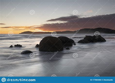 Moeraki Boulders at Sunrise with a Colourful Sky, New Zealand Stock ...