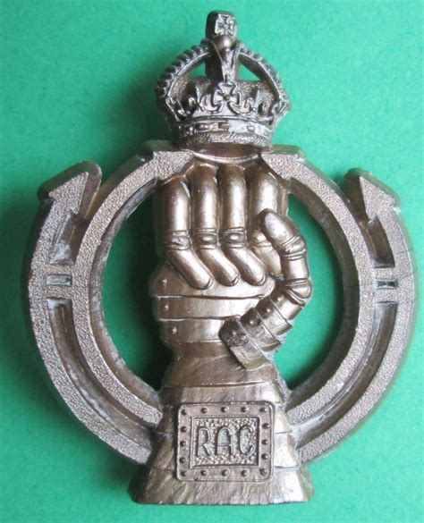 A ROYAL ARMOURED CORPS PLASTIC CAP BADGE