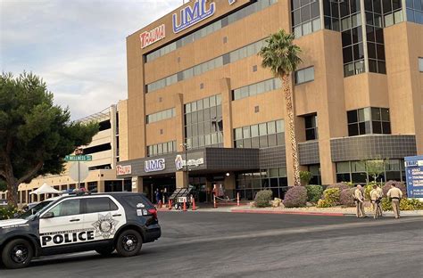 Las Vegas police officers gather at University Medical Center on ...