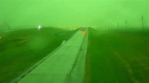 Freak thunderstorm turns sky GREEN in ultra-rare ‘apocalypse-style ...