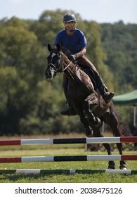 Man Jumping Over Fence: Over 358 Royalty-Free Licensable Stock Photos ...