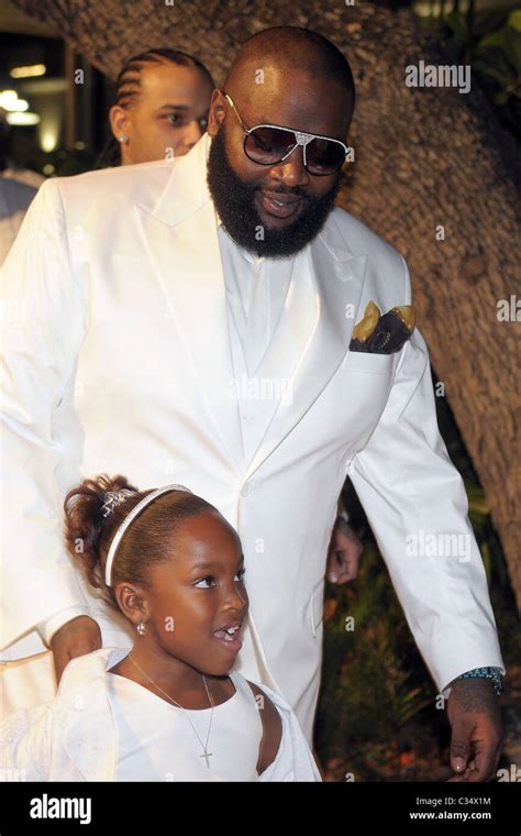 Rick Ross and his daughter Rick Ross celebrates his birthday with his 'Big Boss' all white party ...