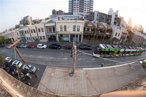 Image of Barrel lens distortion of streetscape taken from rooftop - Austockphoto