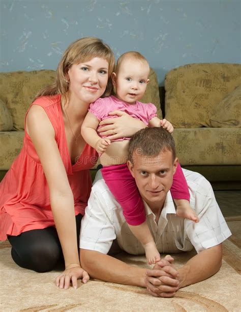 Happy parents with baby stock image. Image of female - 22059029