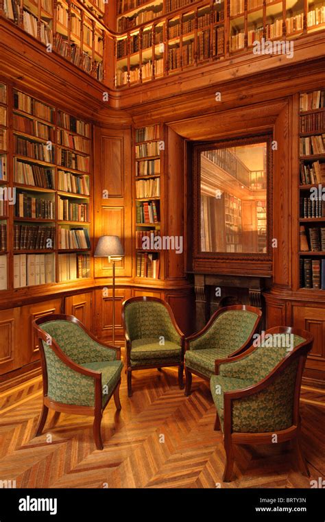 Bookshelves full of old books in private library Stock Photo - Alamy