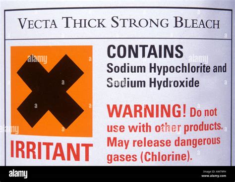 Hazard warning label on bottle of bleach sodium hypochlorite Stock Photo: 16489156 - Alamy