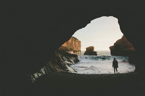 Free Images : beach, sea, coast, rock, ocean, silhouette, person, cave, reflection, terrain ...