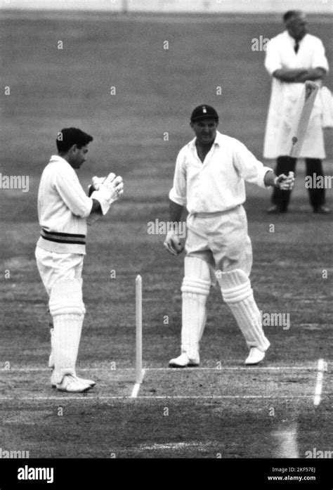 (L-R) India wicketkeeper Farokh Engineer applauds as England's Tom Graveney celebrates ...