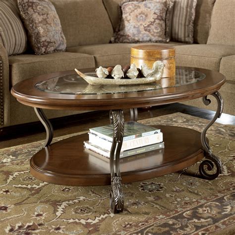 Signature Design by Ashley Nestor Oval Cocktail Table | Royal Furniture | Cocktail or Coffee Table