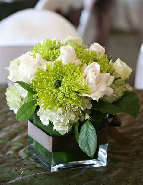 Wedding centerpiece using white roses and green mums. #wedding #centerpiece #rose #whiterose # ...