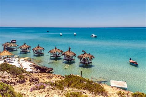 Premium Photo | Group of cabanas on coco beach in bizerte tunisia