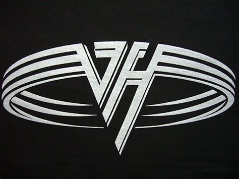 the van halen best of vol 1 album cover art with gold lettering on black background