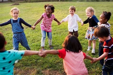 Premium Photo | Group of diverse kids playing at the field together