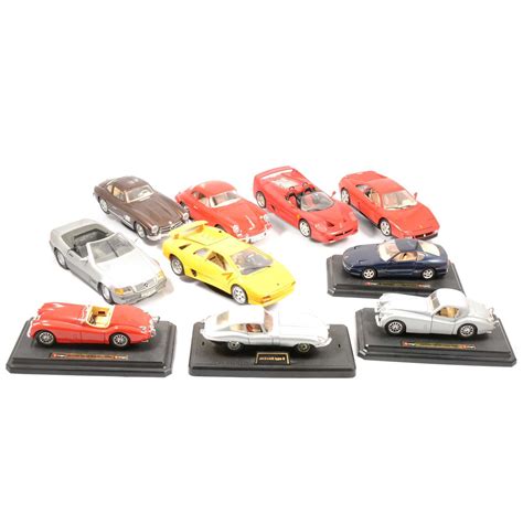 Lot 157 - Burago 1:18 and 1:24 scale model cars, ten