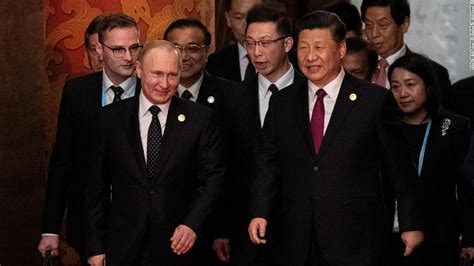 Xi meets 'best and bosom friend' Putin amid raging US trade war - CNN