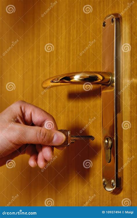 Unlocking Door With Key Stock Images - Image: 10937494