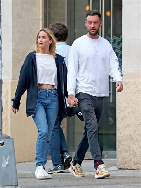 Jennifer Lawrence and boyfriend Cooke Maroney hold hands