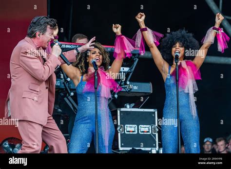 Glastonbury, UK. 24th June, 2023. Rick Astley (with backing singers ...