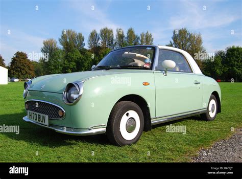 Nissan Figaro 2-seater car, Penshurst, Kent, England, United Kingdom Stock Photo - Alamy