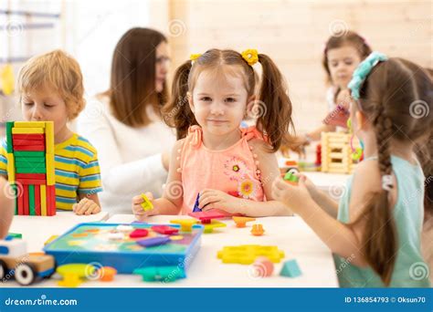 Preschool Children Play with Colorful Didactic Toys at Kindergarten Stock Image - Image of girl ...