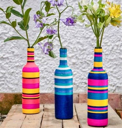 Yarn wrapped wine bottles | Glass bottle crafts, Wine bottle crafts ...