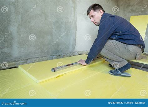 Installation of Expanded Polystyrene in the Room for Floor Insulation ...