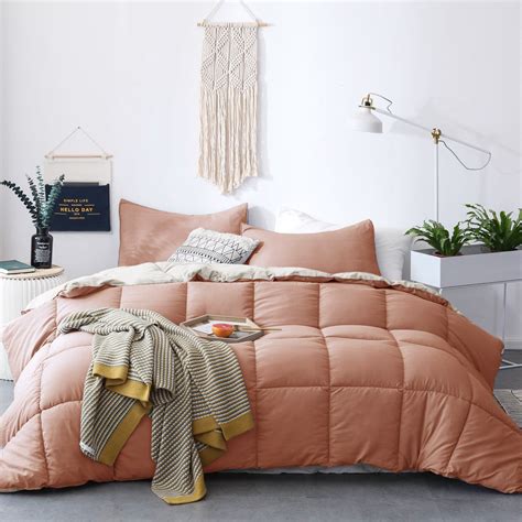 Crafted with down-alternative filling, this fluffy reversible comforter is exceptionally soft ...