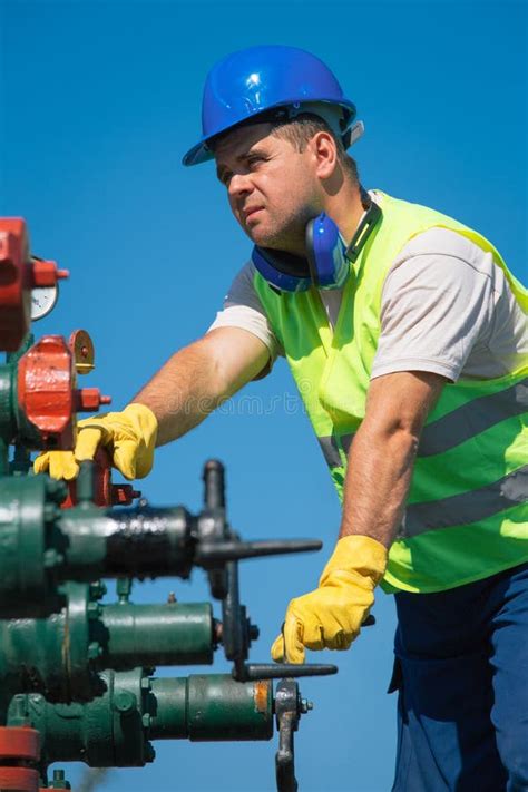 Oil Field, the Oil Workers are Working Stock Photo - Image of work, industry: 73847258