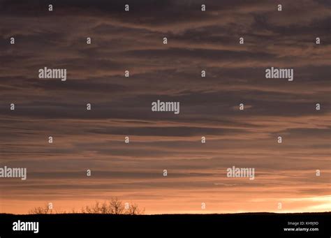 Soft clouds at sunset Stock Photo - Alamy