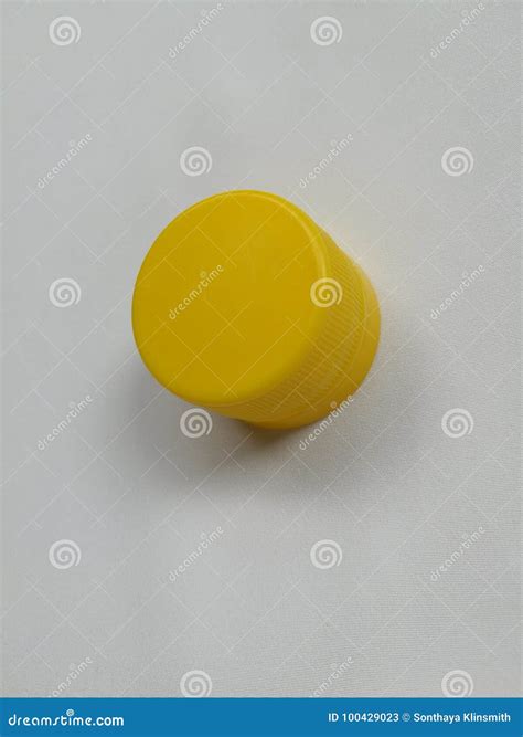 Yellow bottle cap isolated stock image. Image of plastic - 100429023