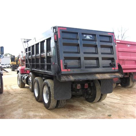 1999 MACK RD6885 TRI AXLE DUMP TRUCK - J.M. Wood Auction Company, Inc.