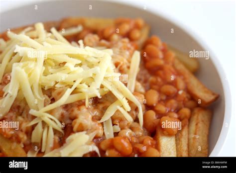 Baked Beans Cheese and Chips Stock Photo - Alamy