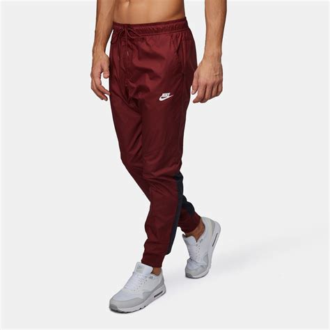 Shop Red Nike Sportswear Windrunner Pants for Mens by Nike | SSS