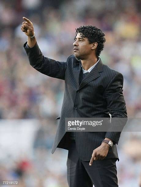 Barcelona manager Frank Rijkaard advises his team during the Primera ...