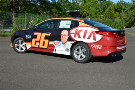 Brown Daub Kia Uses Promotional Vehicle Graphics to Attract Customers!