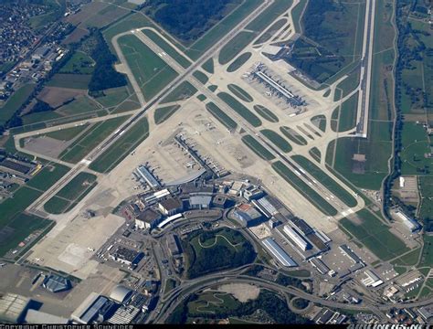 an aerial view of the airport with runway and parking lot in the ...