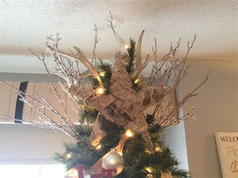 Rustic homemade tree topper ~ birch bark star, snow covered twigs and antlers | Blue christmas ...