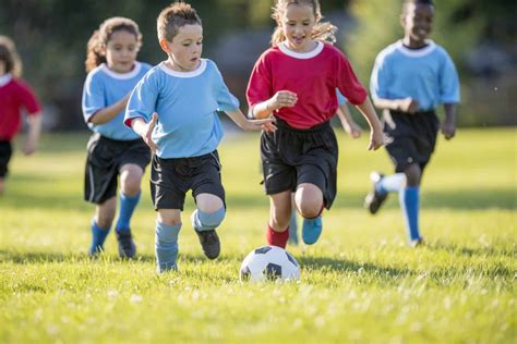 kids playing soccer | US Nanny Institute