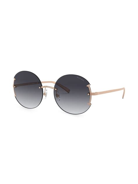 Shop Tiffany & Co Eyewear round frame sunglasses with Express Delivery - FARFETCH