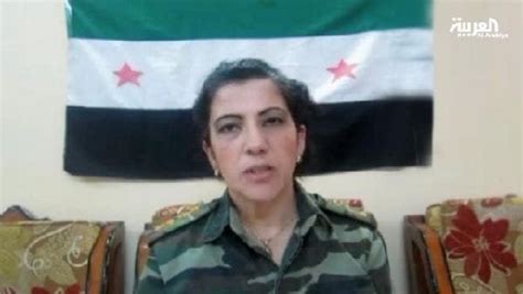 Syrian Alawite female officer defects urges national unity